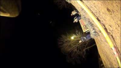 Firefighter catches child thrown from burning building