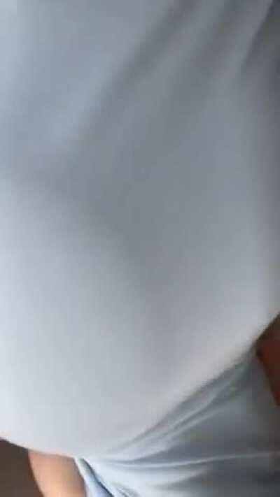 Revealing her massive mammaries