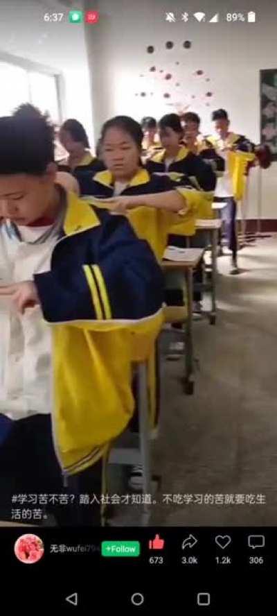 This is how hair dressers and chefs receive their training in China. They are senior high school kids, but like soulless robots... It looks very sad even a bit creepy to me.