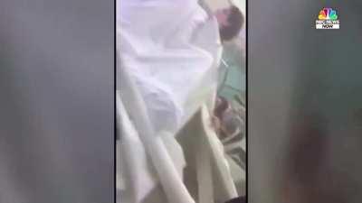 A mother was giving birth as the Beirut explosion smashes into a hospital while the father was recording.