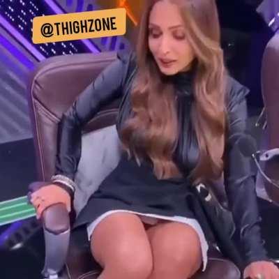 When the guy under the desk does a satisfactory job of licking Malaika's thunder thighs