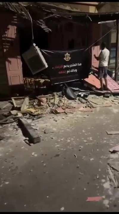 Israeli army destroyed a Palestinian store in Qalqilya that made a pro-Hamas post mocking one of the kidnapped Israeli civilians. The army also made sure to leave a clear sign about the reason for the demolition 