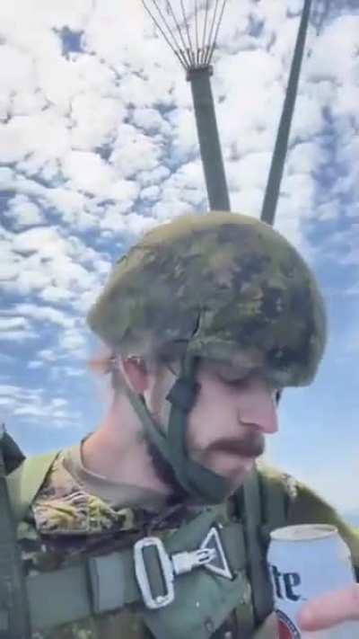 Canadian Soldier Parachuting While Drinking Beer