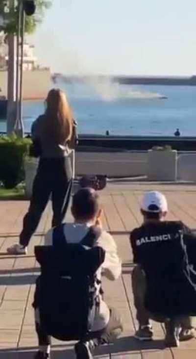 Russian civilians filming as Russian army attempting to repel attack by naval drones. Tuapse, Russia, September 24, 2025