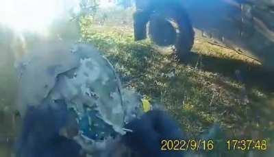 Helmet saves an American volunteer's life. ''A rocket bounced off my head?!''