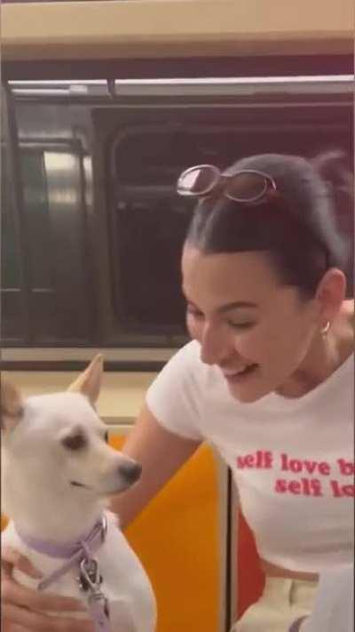 Giving a stranger a drawing of herself