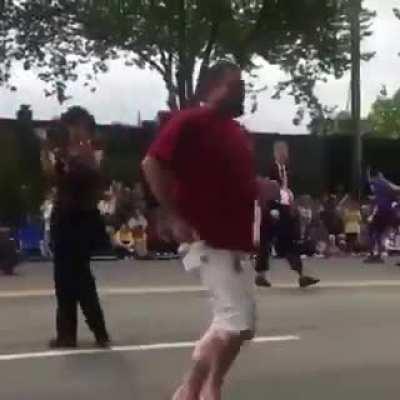 He's literally getting kicked on his way out.