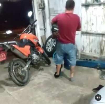 Man beaten and slapped with a helmet on