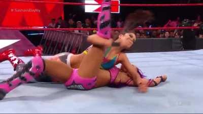 Top rope Bayley-to-Belly on Sasha Banks