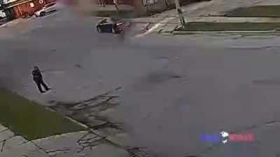 Let's play; approach a police officer with weapons in each hand.