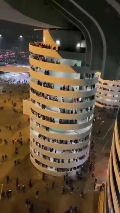 The descending movement of people at San Siro Stadium in Milan, Italy creates the illusion for our brains that the staircase appears to turn in the same direction