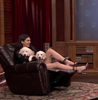 Kendall Jenner leggy and cute with puppies