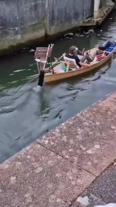 A Canoe with an interesting propulsion system 