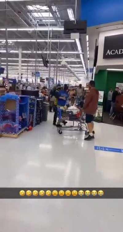 Don’t turn your back on someone you just mauled with a shopping cart. Stupid games at a Walmart.