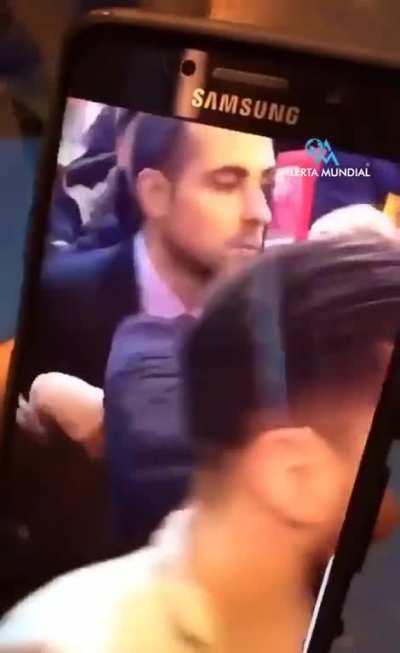 French president Emmanuel Macron hit with an egg.