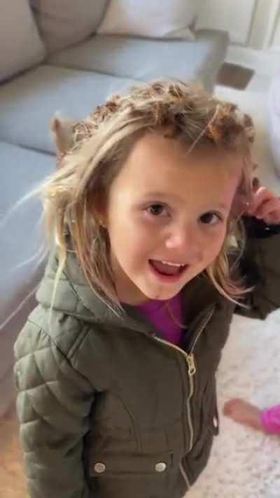 She collected new hair accessories from outside