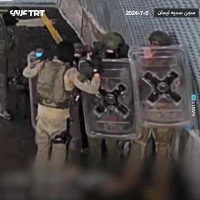 Idf soldiers take turns raping a Palestinian prisoner while others form a wall of shield. Video released by Israel broadcasting authority