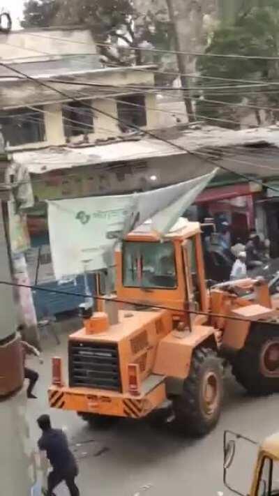 No parking space still goes on to destroy those bikes in front of the mob for illegal parking