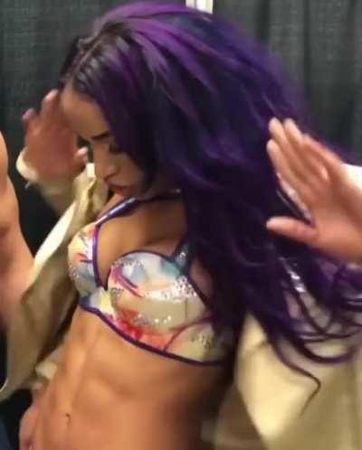 Showing off her perfect abs