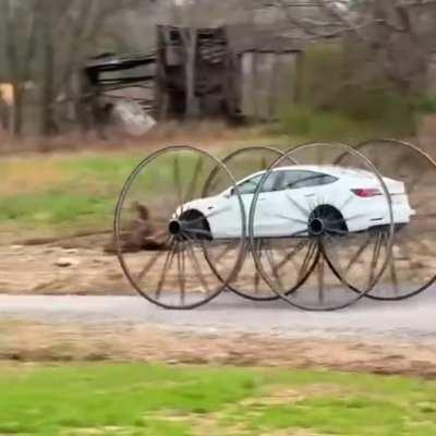 A car with a bigass wheels for tyres