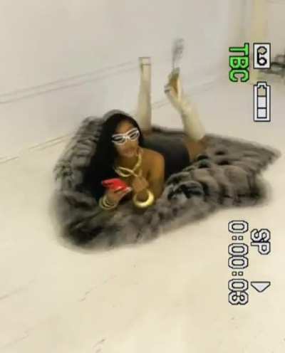 On her stomach legs opened and up I know that view from behind is crazy😍😍🤪