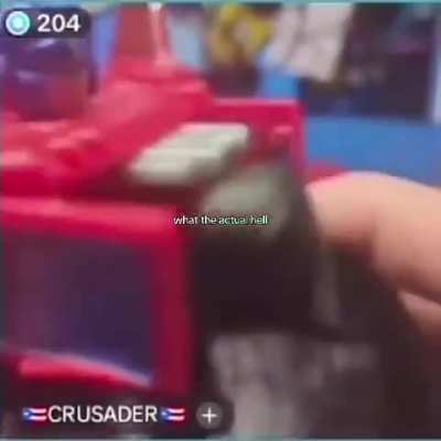 Man doing his special technique on Optimus 