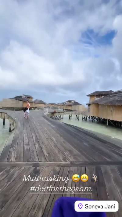 Mandy Rose filming herself cycling