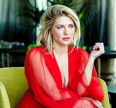 In red transparent dress