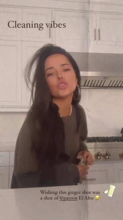 Becky singing while doing some cleaning