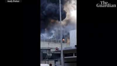 A tanker truck explodes in Bologna, blowing a hole in a roadway overpass