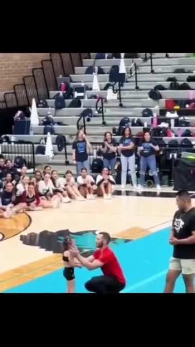 Her failed stunt made her cry. Her coaches encouragement gave her strength to try again.