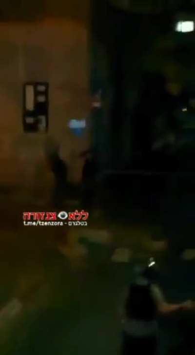 Palestinian records IDF going door to door. He ends up getting shot at.