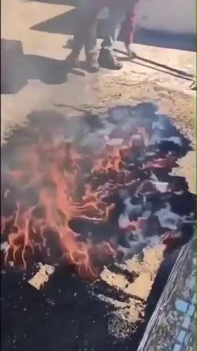 The puddle of tar on fire looks like a portal to hell