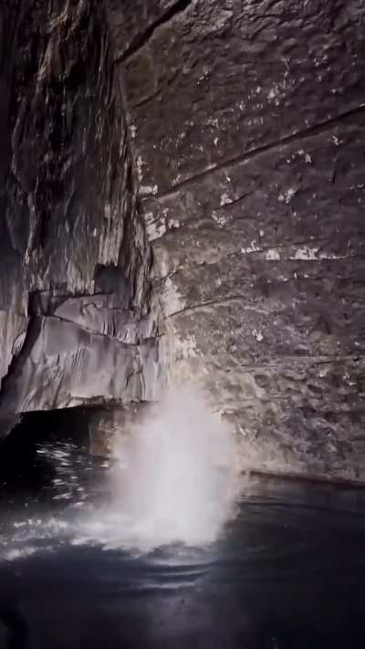 This jump into a pool in a cave