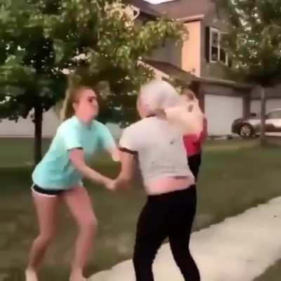 Girl fights Karen for refusing to leave her yard...