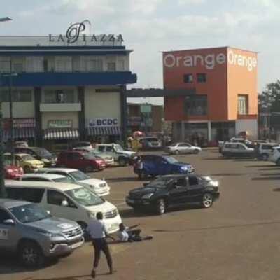 Standing behind someone who can't properly park a car