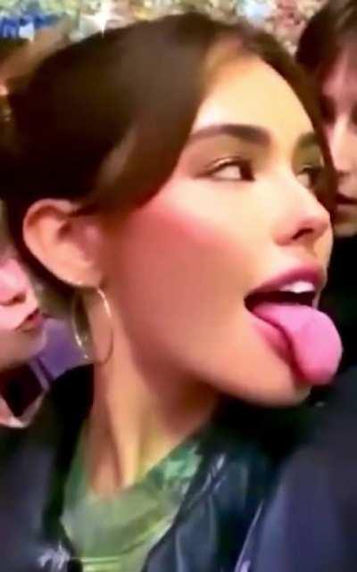 Sticking her pretty tongue out