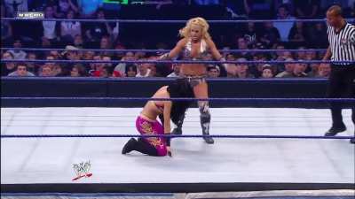 Melina getting kneeled & kicked