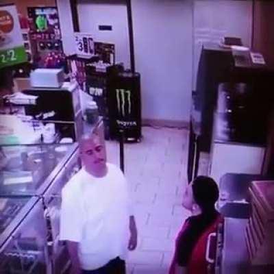 idiot tries to sucker punch cashier