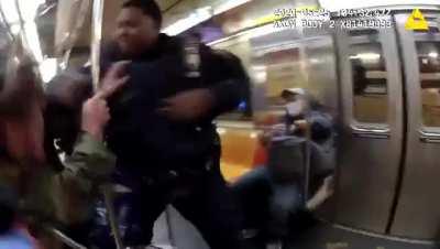 Cop Punching Man on Manhattan Subway. Full video in comment section.