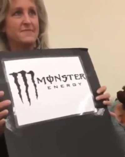 A Karen spreading false information about the Monster logo.