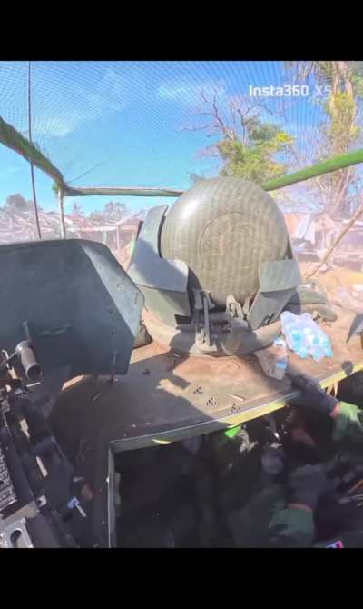 Thai soldiers are clearing areas occupied by Cambodian forces, using M113 and VT-4 vehicles.