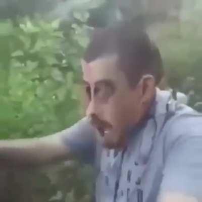 Man wears mask out of a human face