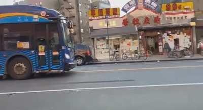 Trying to trash a car with the driver being inside it.