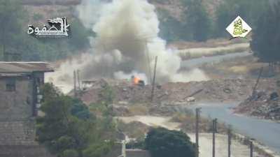 Al-Safwah Battalions TOW hit on BMP, one crew member bails, Syria, Al Ramoseh area Aleppo city, 2016