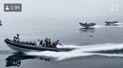 Dude is literally flying in the air in a jet suit