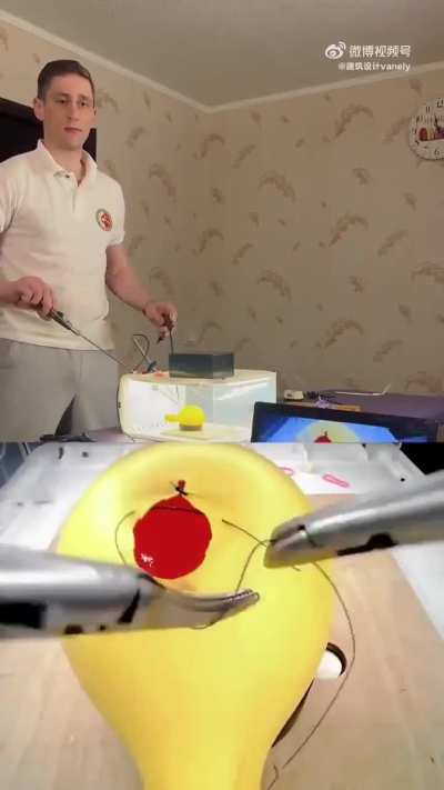 A surgeon showed that he could sew up a balloon without making it burst