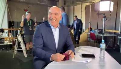 Gorden Tallis shows Michael Ennis a Magic Trick