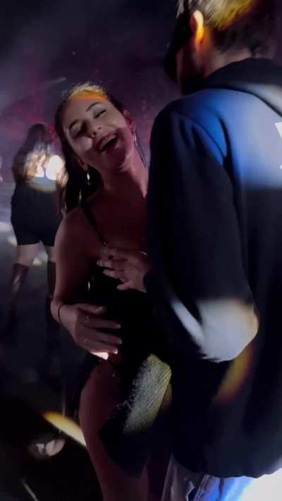 Exposing tits at a party