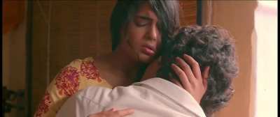 Local hooligan wants to enjoy sniffing/kissing uninterested young girl after she sits on his lap